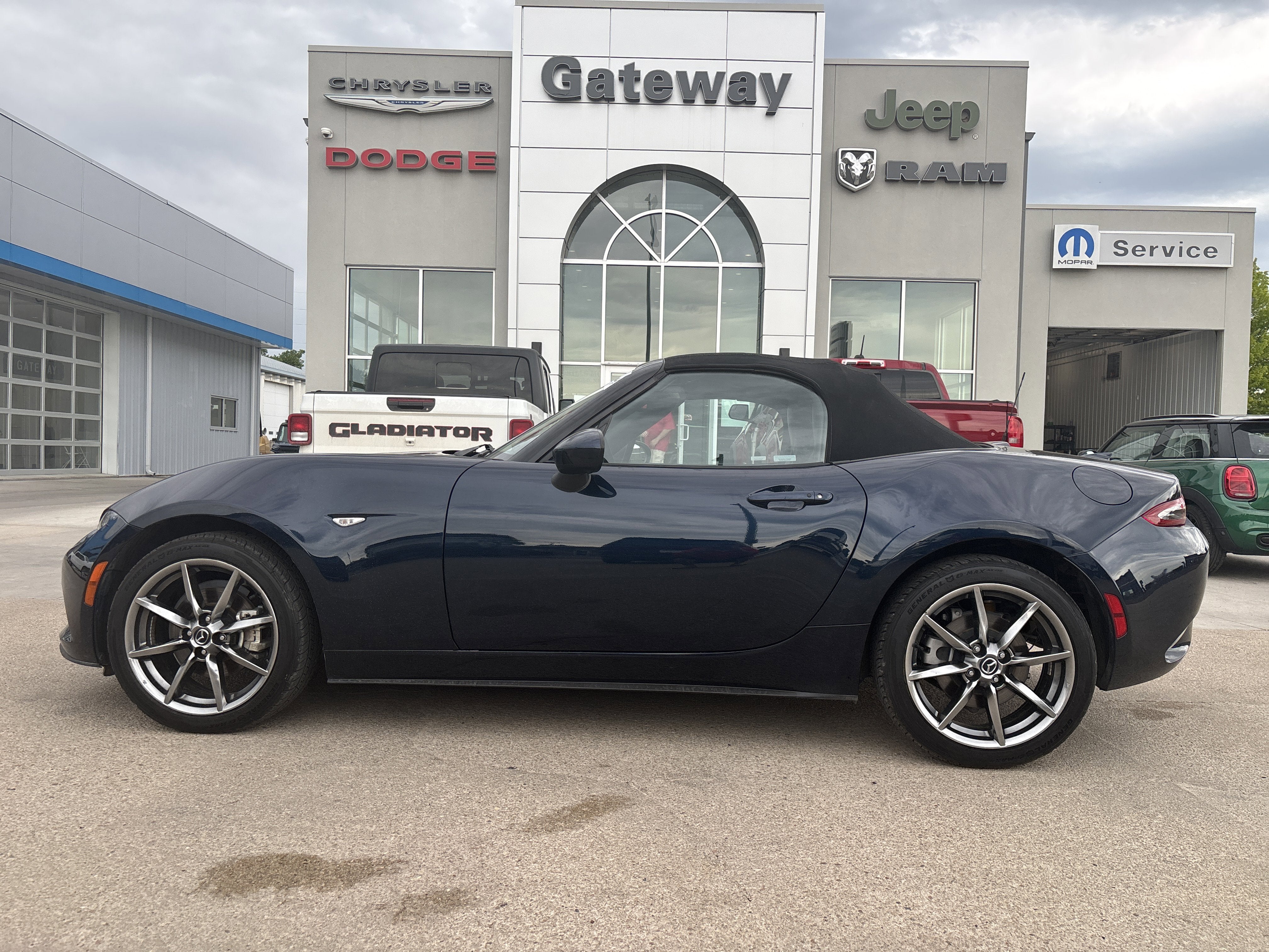 2021 Mazda Mazda MX-5 Miata Grand Touring in Deep Crystal Blue — front three-quarter view